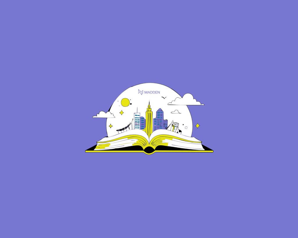 An open book with a stylized city skyline rising from its pages
