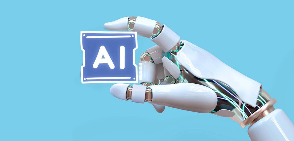 A robotic hand holding a square icon with the letters AI on it