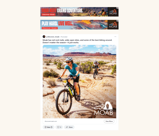Two mountain bikers riding on a desert trail in Moab