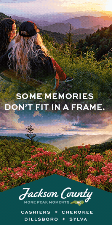 Two people enjoying a mountain sunset view with text overlay