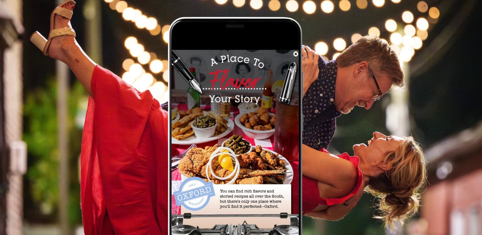 A smartphone displays a food advertisement over a couple dancing in the background